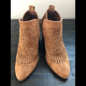 Lightly used “Beast Fashion” brown booties. Size 6
